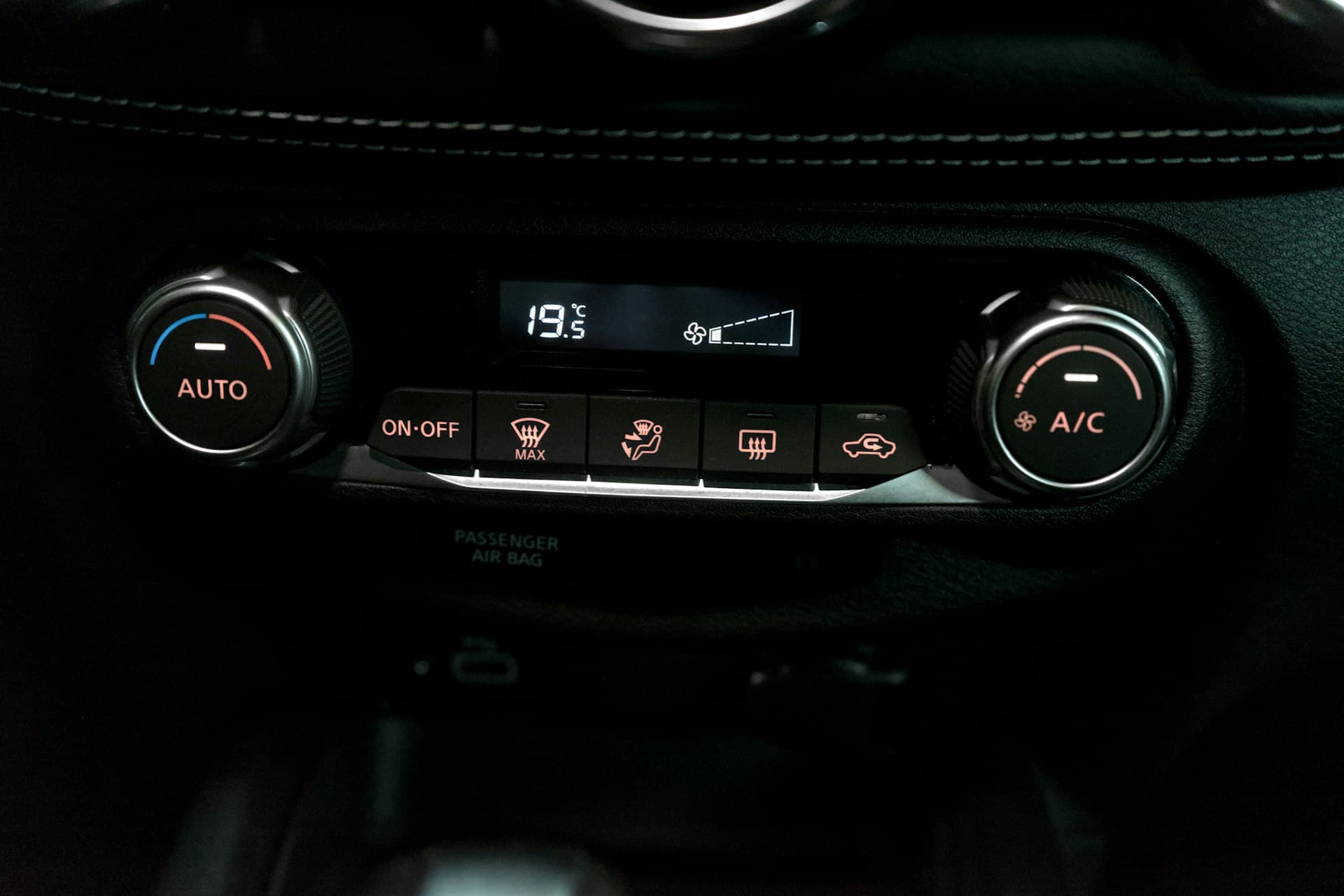 Climate control panel with the A/C button